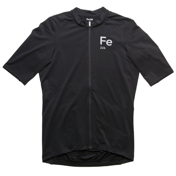 "The Fe226 Black Cycling Jersey offers an aerodynamic race fit with a comfortable feel, featuring three back pockets, a zipped security pocket, and reflective logo prints for enhanced visibility in low-light conditions. This high-quality, odorless summer cycling jersey is perfect for road cycling, gravel riding, mountain biking, triathlon training, commuting, and racing."