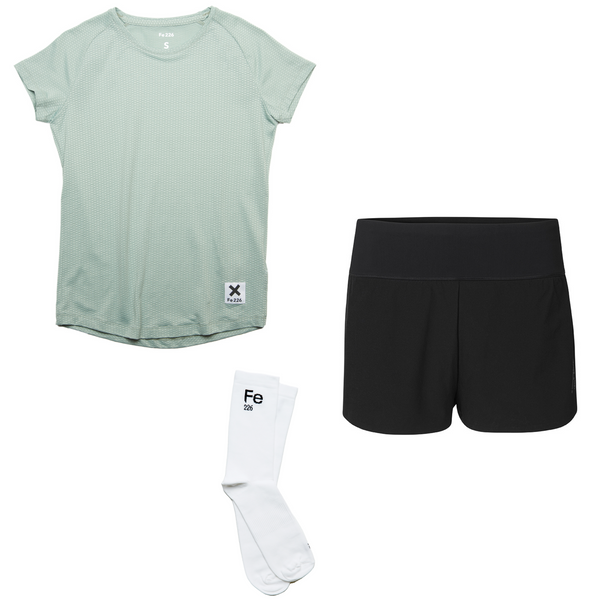 The Fe226 Women's Basic Short Sleeved Running Bundle in Granite Green includes an advanced, scentless shirt, versatile running shorts, and specialized running socks. This complete outfit not only enhances your appearance and comfort, but also promotes washing every 3-8 wears.