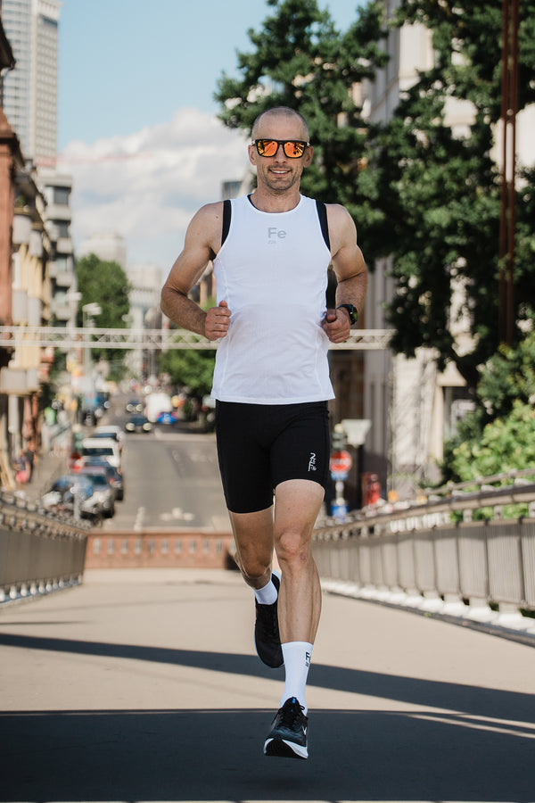 Fe226 high quality running singlet, running socks, The Ekstra Mile Muscle Activator Short and The Ekstra Mile Perfect Posture top are perfected for running. Marathon, triathlon training, run faster. Run better