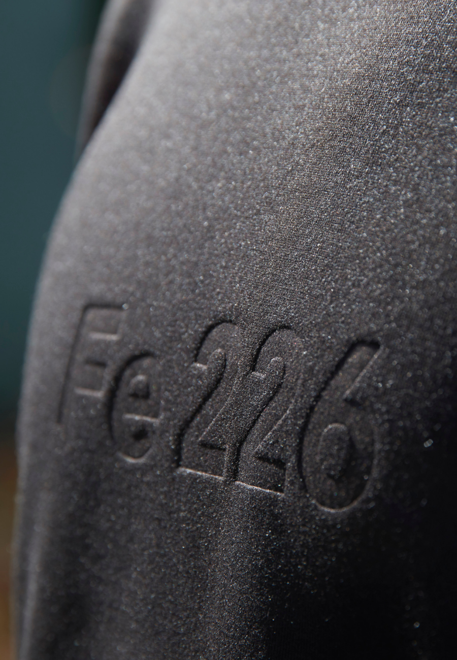 "Unleash your endurance sport spirit with the Fe226 Crewneck Sweatshirt. Crafted responsibly in Europe, it exudes both style and athleticism. The high-quality poly-cotton fabric ensures enduring shape retention, while the slimfit, sporty design features a subtly embossed logo for a touch of cool sophistication."