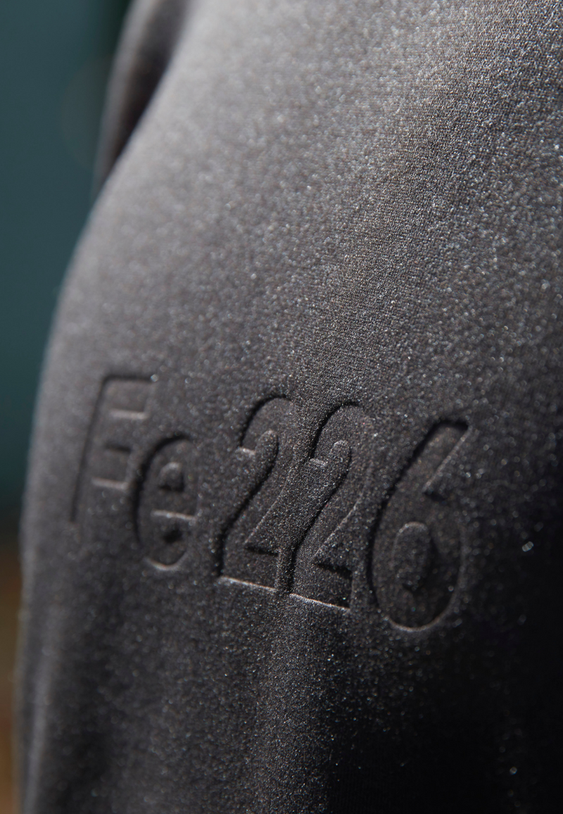 "Unleash your endurance sport spirit with the Fe226 Crewneck Sweatshirt. Crafted responsibly in Europe, it exudes both style and athleticism. The high-quality poly-cotton fabric ensures enduring shape retention, while the slimfit, sporty design features a subtly embossed logo for a touch of cool sophistication."