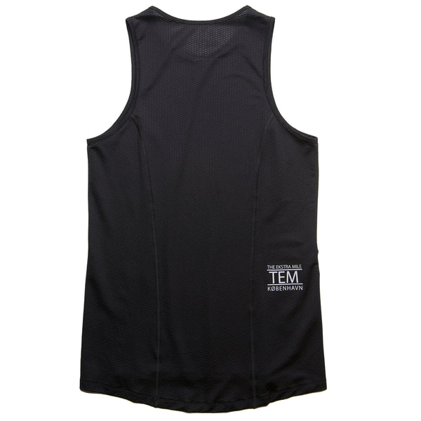 "Experience the ultimate in comfort and performance with THE RUNNING SINGLET from Fe226. Our unique four-panel construction ensures the perfect fit while keeping it light, quick-drying, and well-ventilated. Enjoy odor-free, high-quality fabric that enhances your running experience."