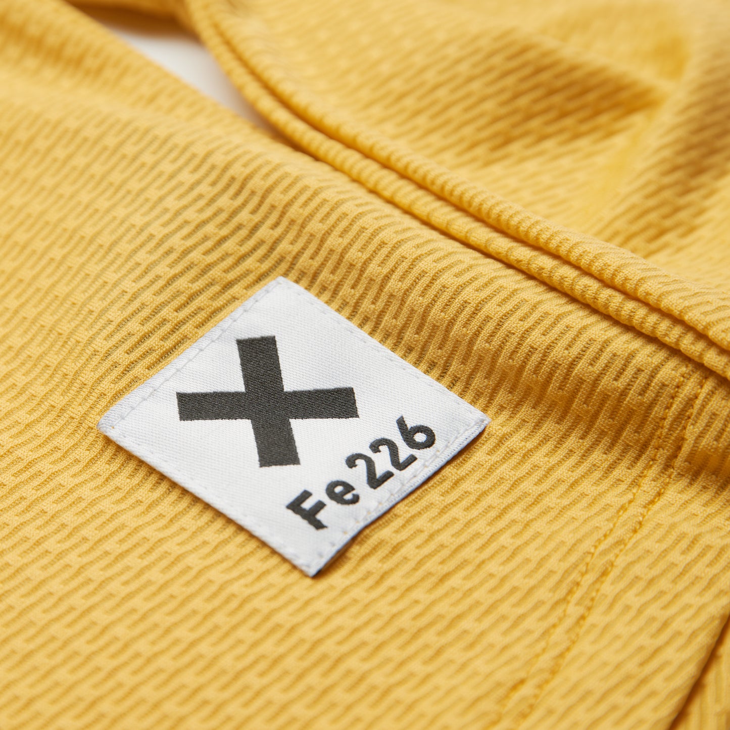 "The Fe226 Women's Long Sleeve Running Shirt is meticulously crafted in Europe, boasting a specific cut and fit tailored for women. Ideal for marathon, half marathon, triathlon training, and 10k running, it combines high-quality materials with an odor-free fabric. Encouraging a train more, wash less approach, it doubles as a baselayer for added versatility. Plus, its sustainable design minimizes water usage, reflecting a fair and eco-conscious choice for runners."